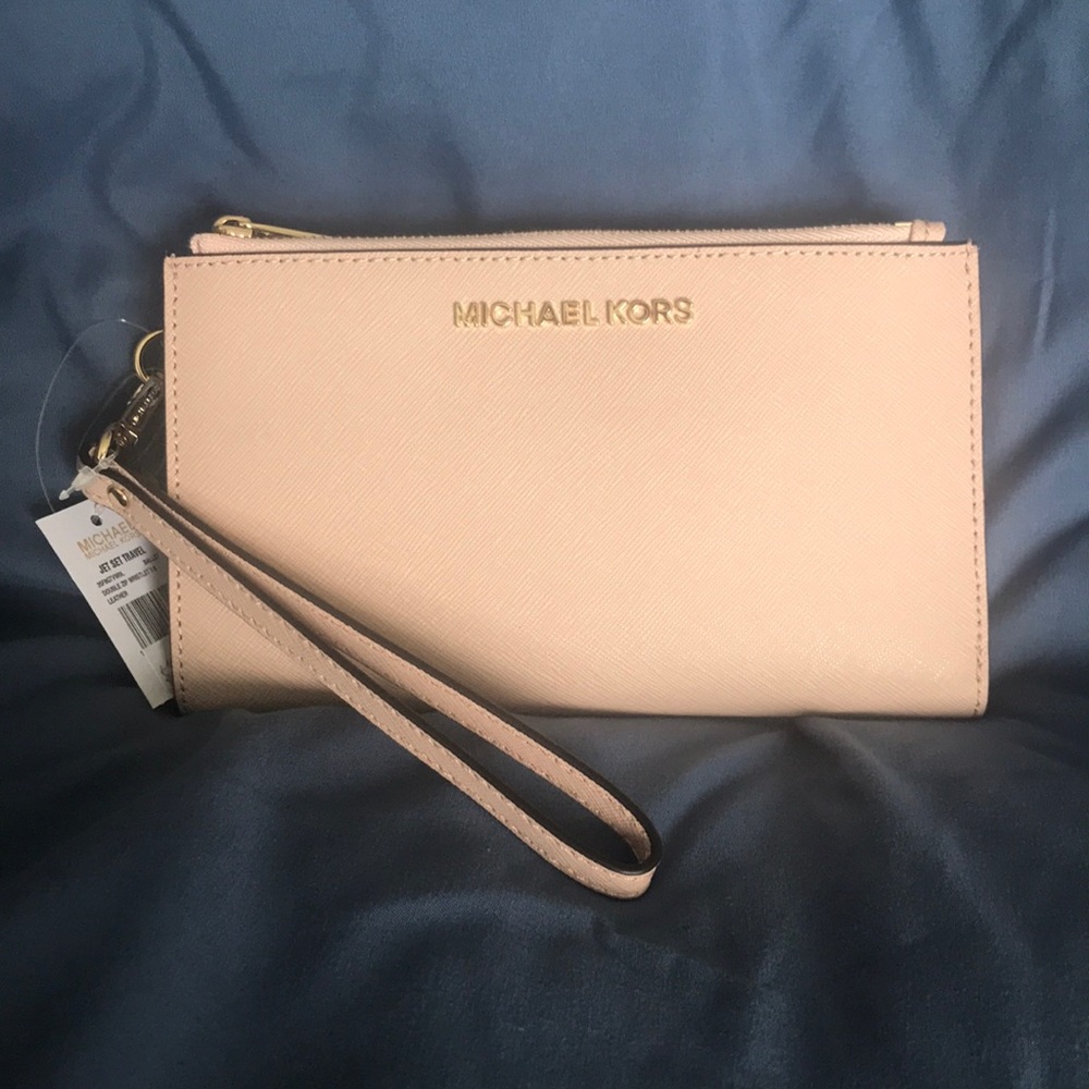Michael Kors blush pink wristlet